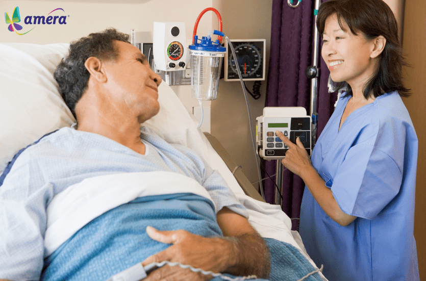  A nurse and a patient engaged in a discussion in a clinical environment.
