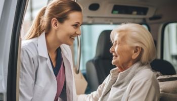 Medical professional providing outpatient transportation for a patient in Conroe, TX